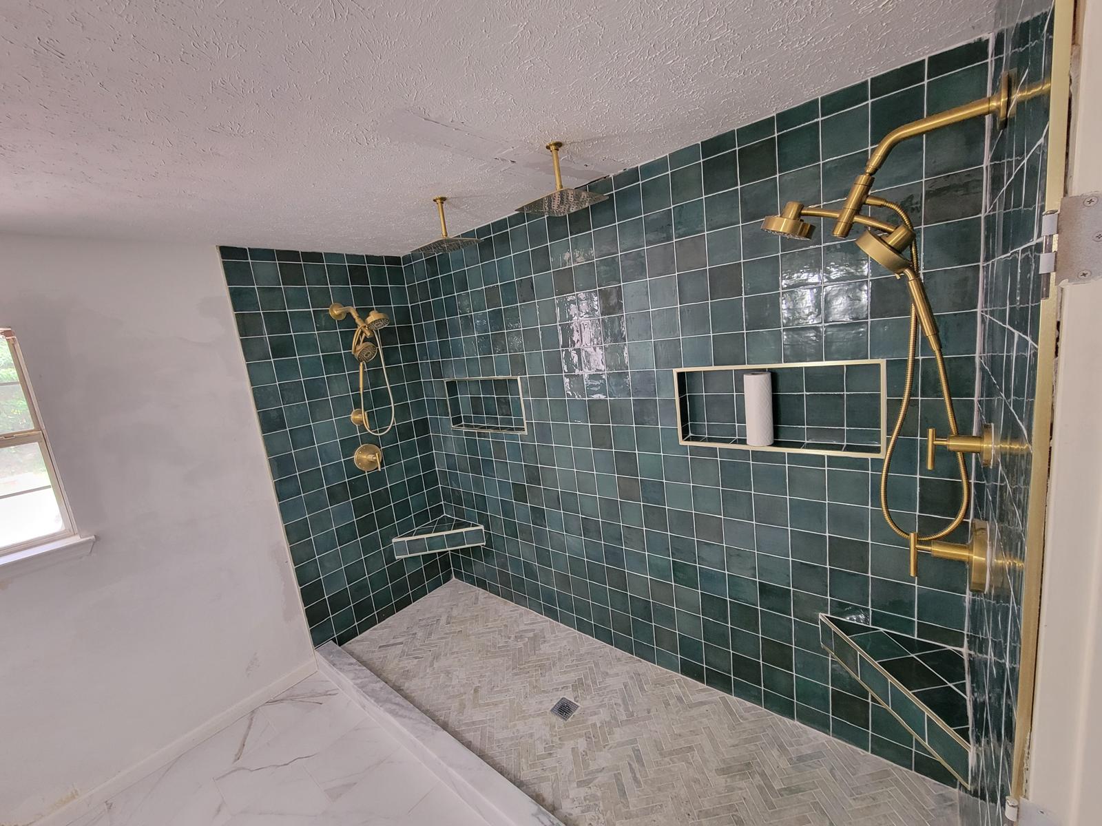 Blue tile shower in progress
